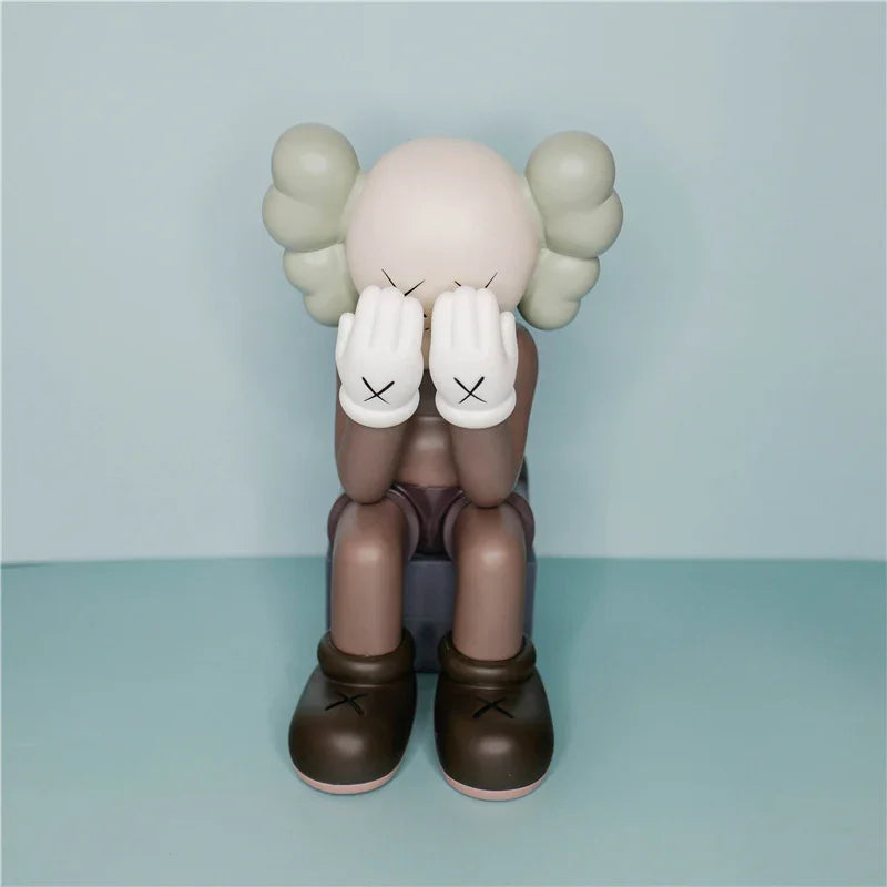 Surrealistic sculpture with a neutral expression on a light blue background