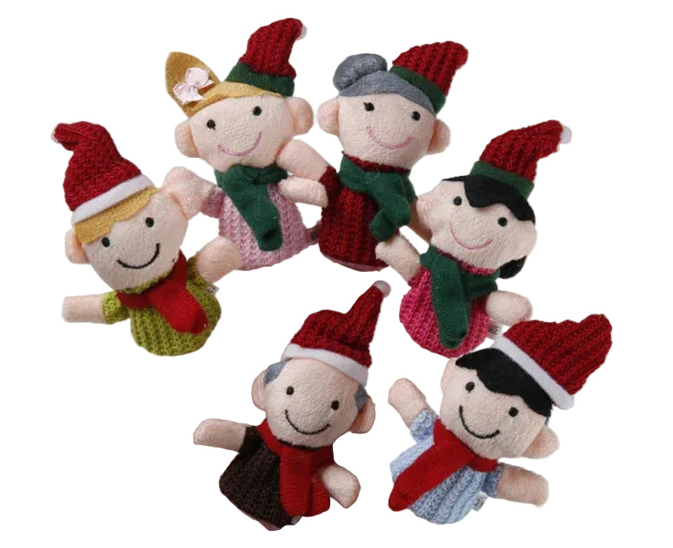 Set of six knitted finger puppets in Christmas-themed outfits on a hand against a white background.