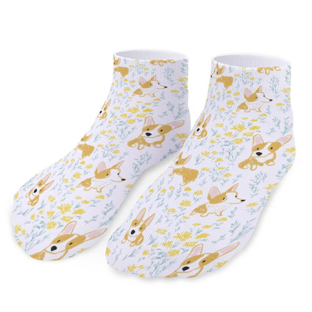 Pair of socks with corgi dog pattern on a white background