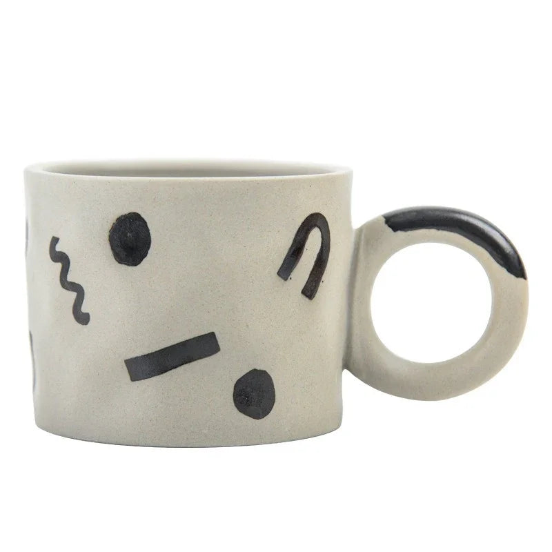 Mug with a face design on a white background