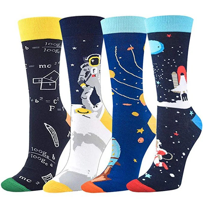 Four pairs of socks with space-themed designs on a white background
